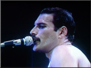 Freddie on piano (Live Aid, Wembley Stadium, 1985)